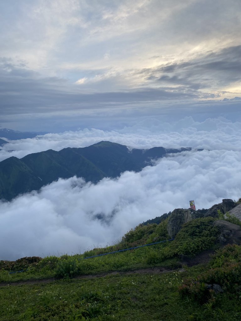 Sea of clouds over mountain valleys